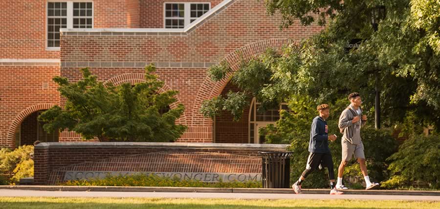 Students walking in front of Niswonger Commons on campus
