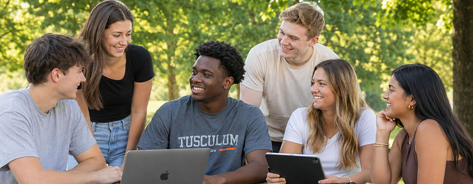 Tusculum students enjoying working outside on a class project