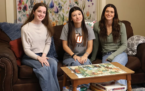 DLLC students in their house